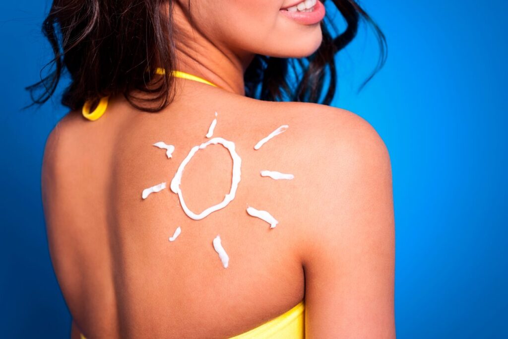suntan-lotion-woman-s-arm-sun-shape