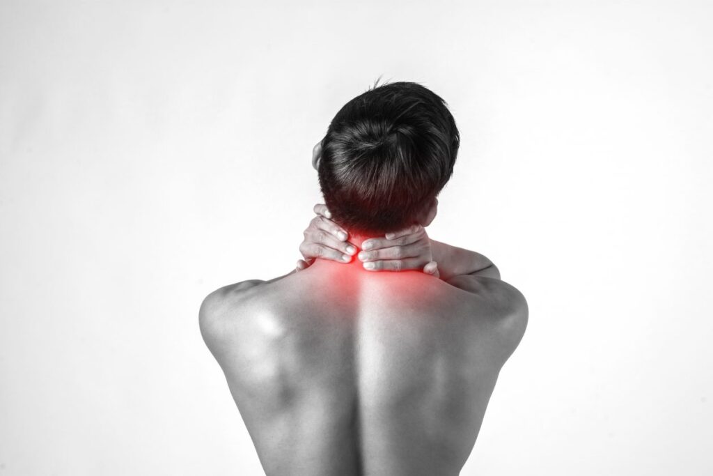 muscular-man-use-handles-neck-relieve-pain-isolated-white-background