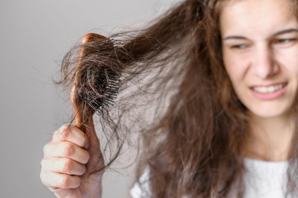 woman-struggling-brush-hair