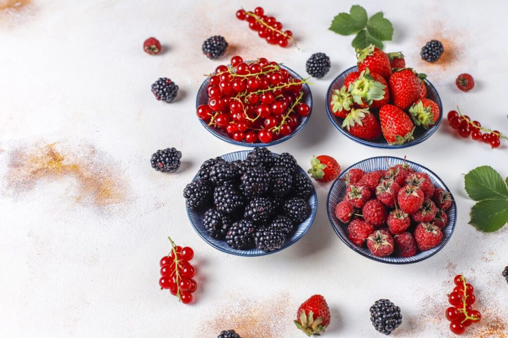 various-fresh-summer-berries-blueberries-red-currant-strawberries-blackberries-top-view